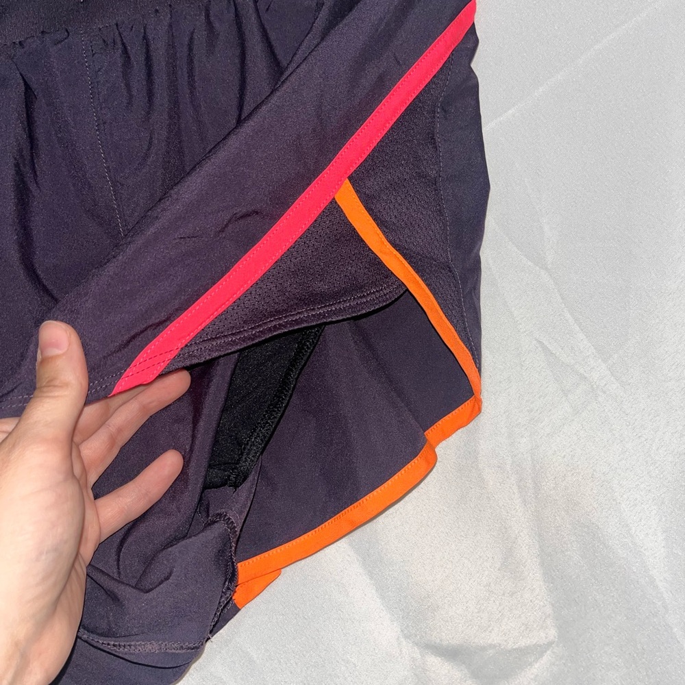Under Armour Women's Purple Running Shorts with Neon Orange and Pink Accents - Picture 4 of 12